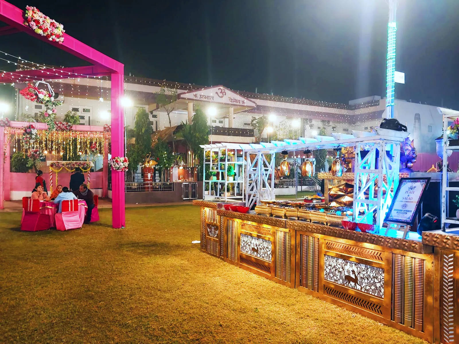 Pure-veg food counters set up on the garden for guests.