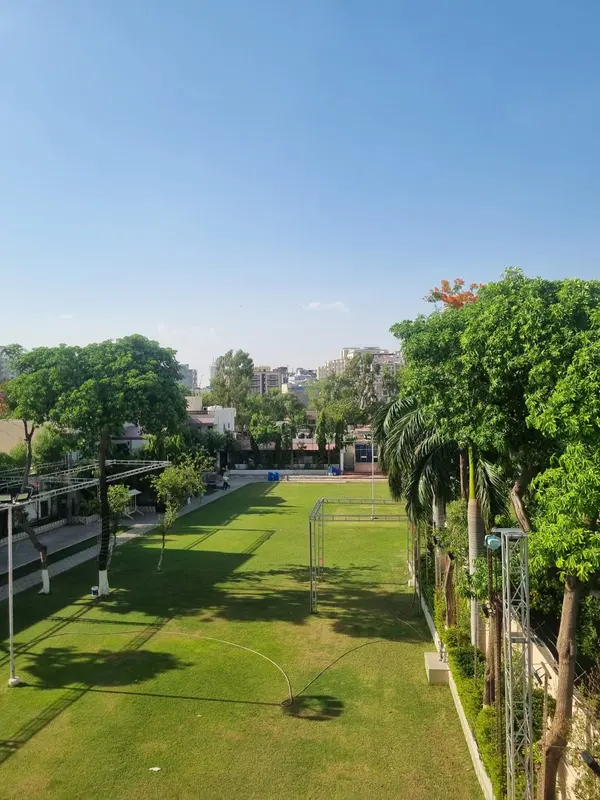Shade trees along the lawn for day functions