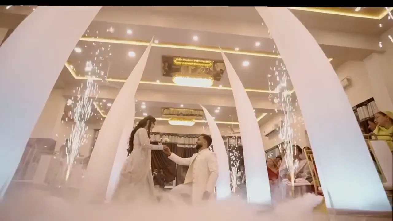 Couple's Entry in the Banquet Hall